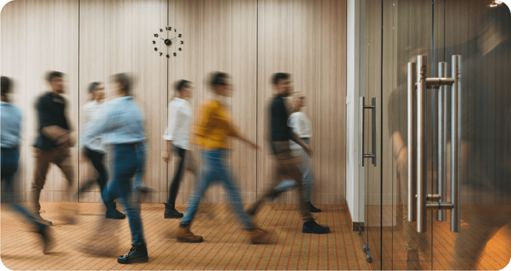 a group of people standing in a room