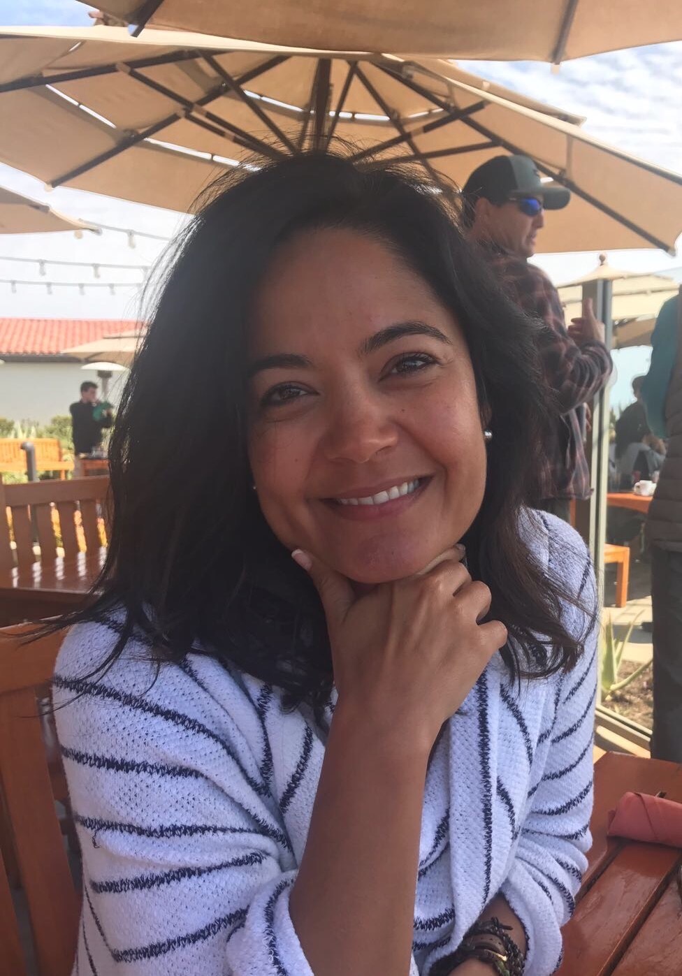 a woman smiling for the camera