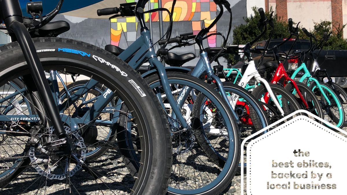 a bicycle is parked next to a motorcycle